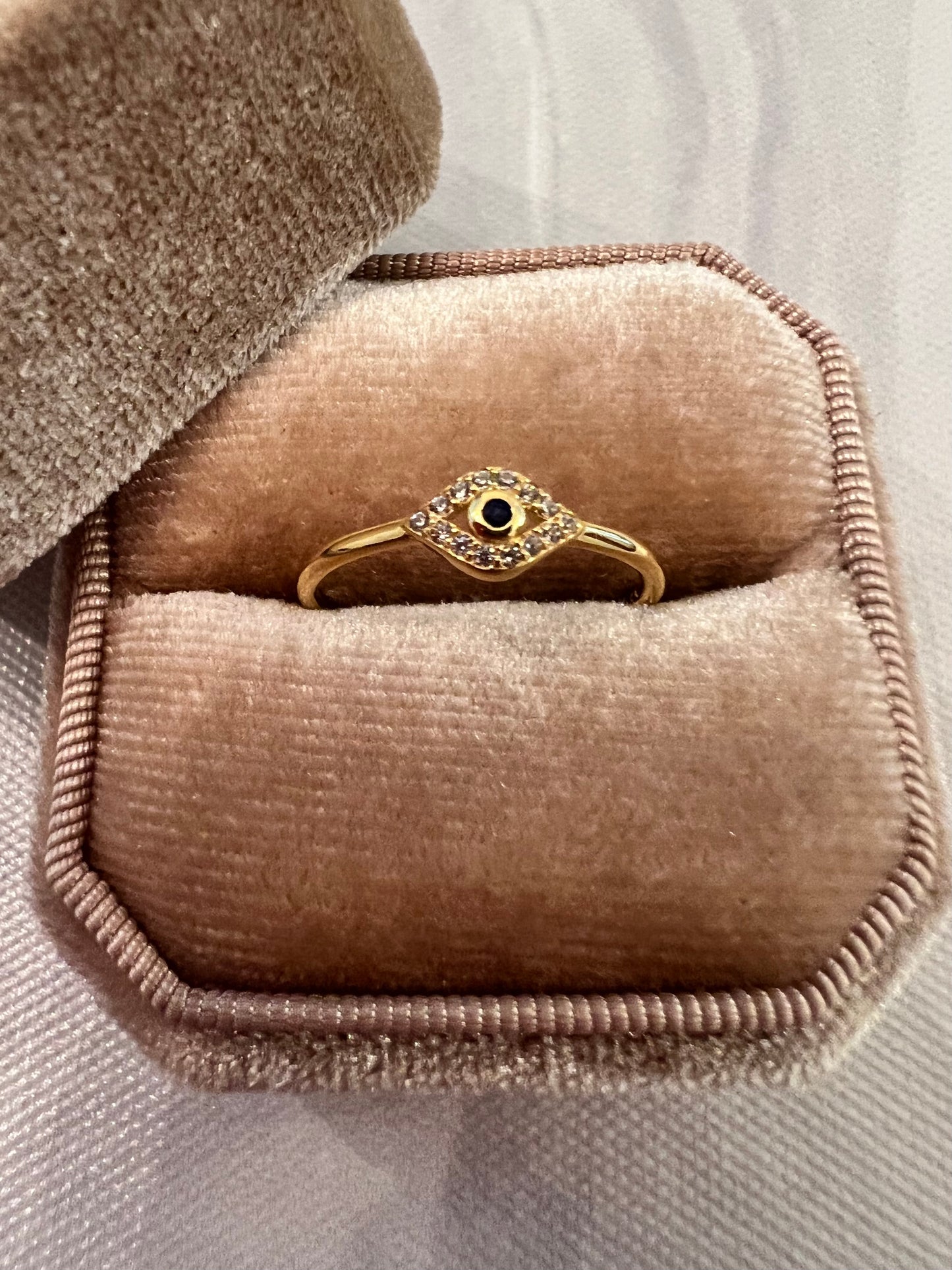 Golden evil eye