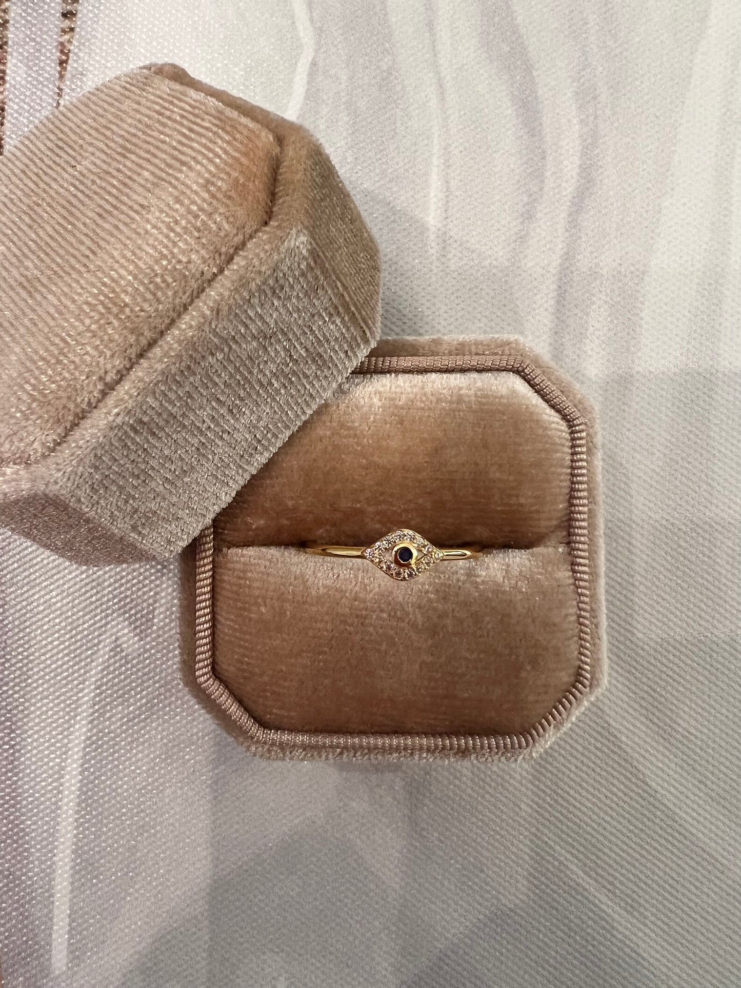 Golden evil eye